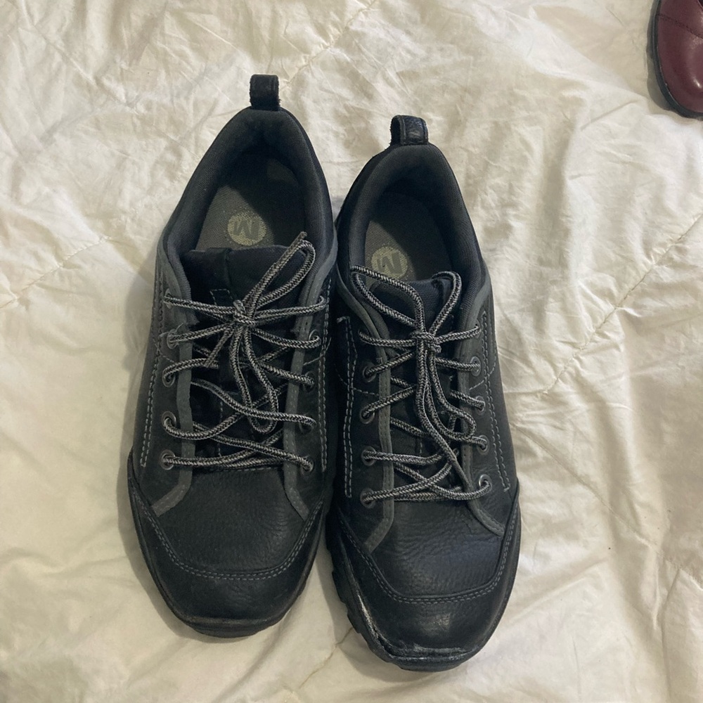 Men's Black Merrell’s. Size 9.5. Left toe is loose